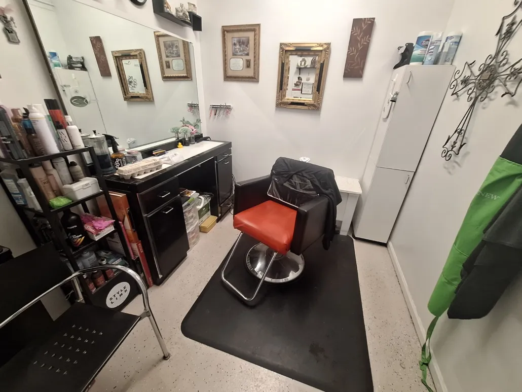 A stylist's station ready for the next guest at Creations